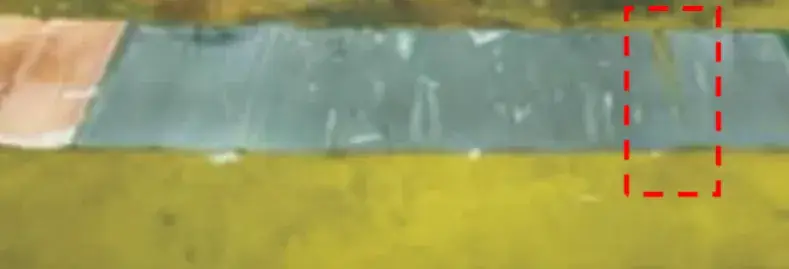 Figure 2. Fractured Battery Electrode Sheet Post-Cycling